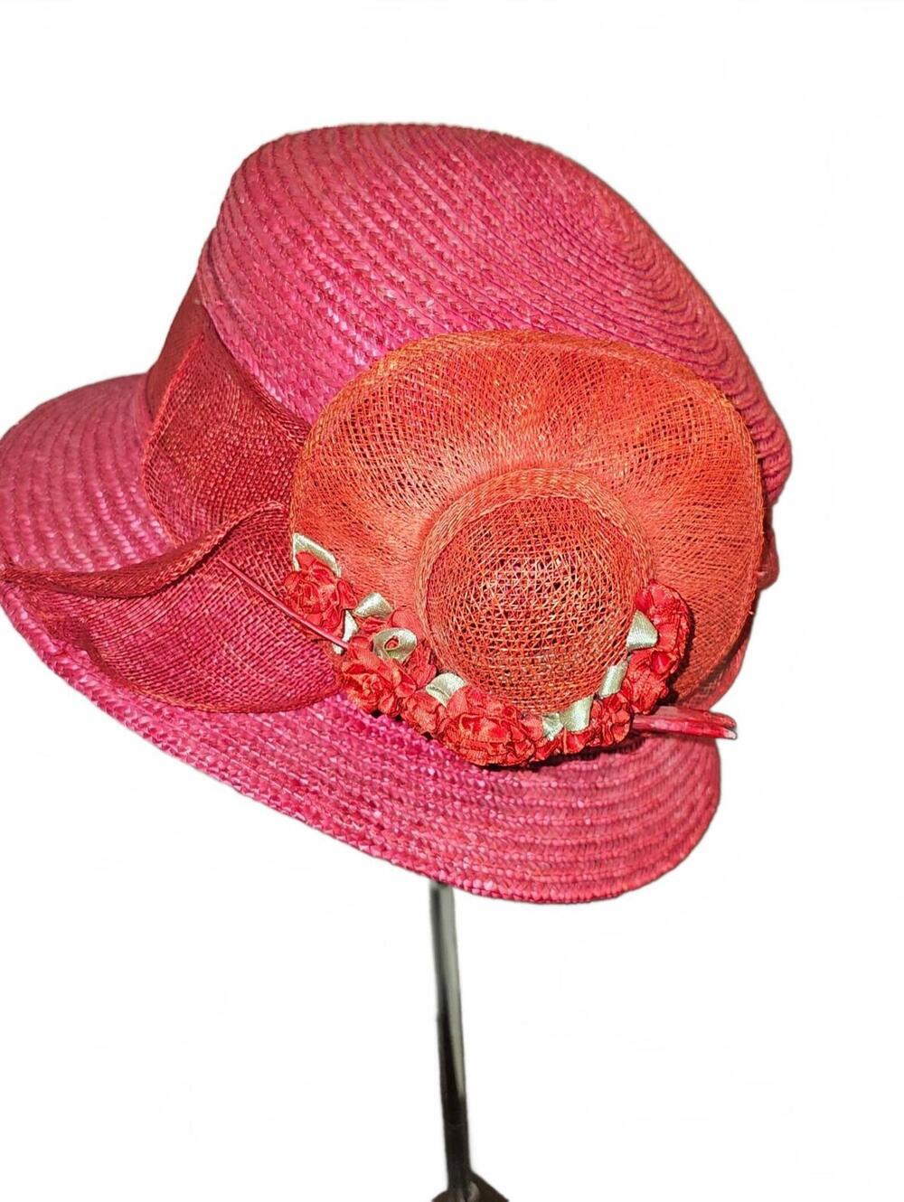 Pink Betmar hat with orange flower